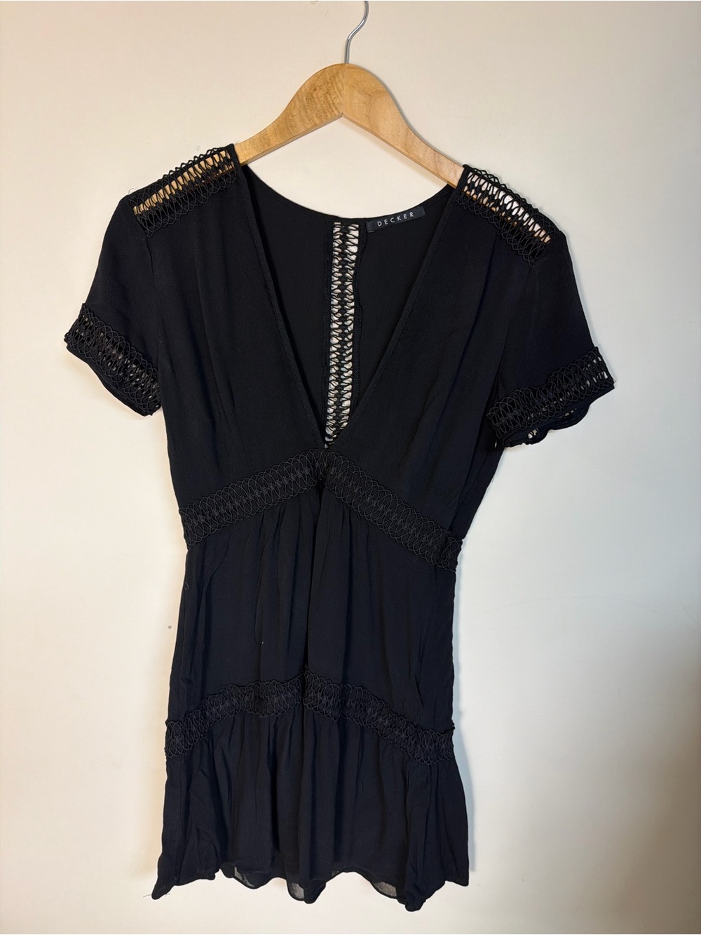 Decker black short-sleeve mini dress with crochet details